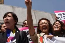 Women Cross DMZ at a demonstration outside the US Embassy in Seoul, 25 May 2018. 