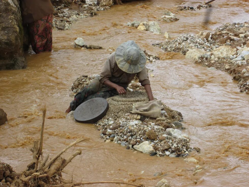 A woman who works in the waters for the whole day for a living. 