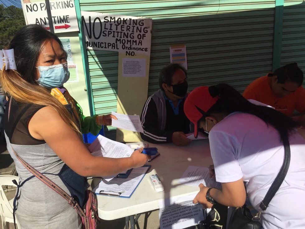The municipality of La Trinidad is strictly enforcing the documentary procedures for those entering the town such as accomplishment of health declaration form and securing of barangay health certificate to prevent the transmission of COVID-19. (photo by JJM-PIA-CAR)